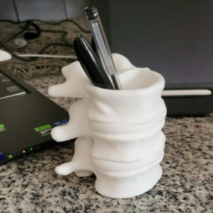 spine pen holder